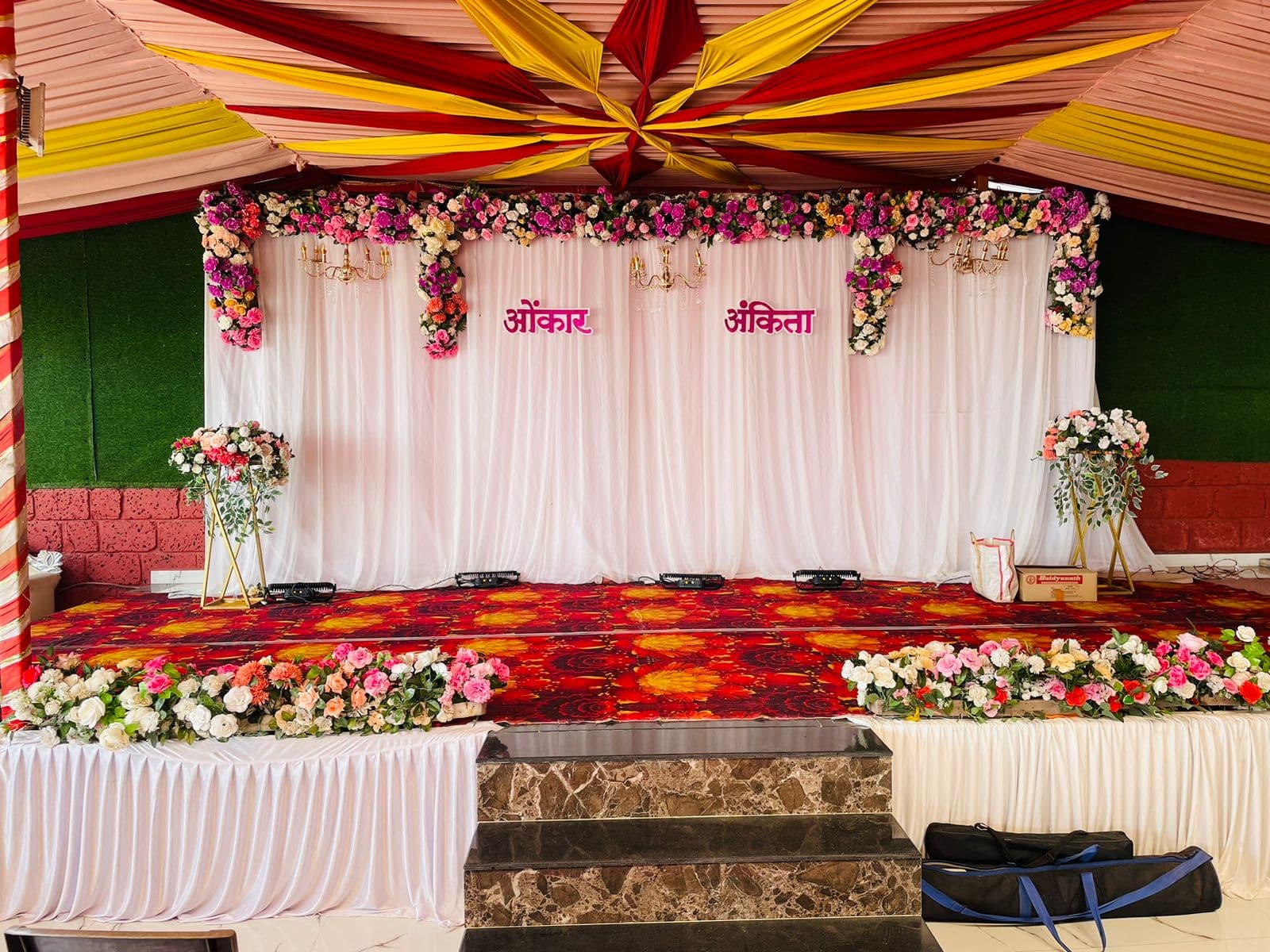 Floral stage under a colourful canopy at Shrileela