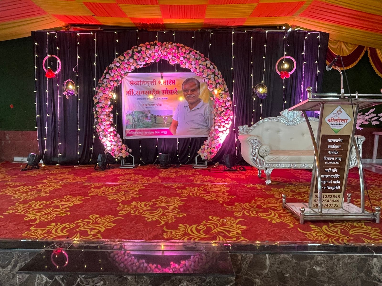 Shrileela stage decorated for a retirement celebration